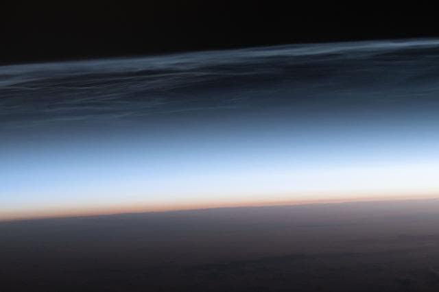 Noctilucent clouds are pictured `above far western Kazakhstan