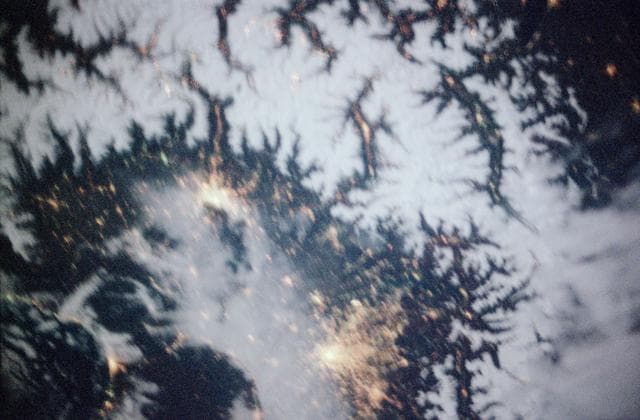 Earth observations of city lights in the Alps taken during STS-97