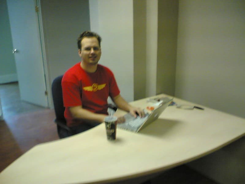 Richard at his spiffy new desk at our spiffy new offices