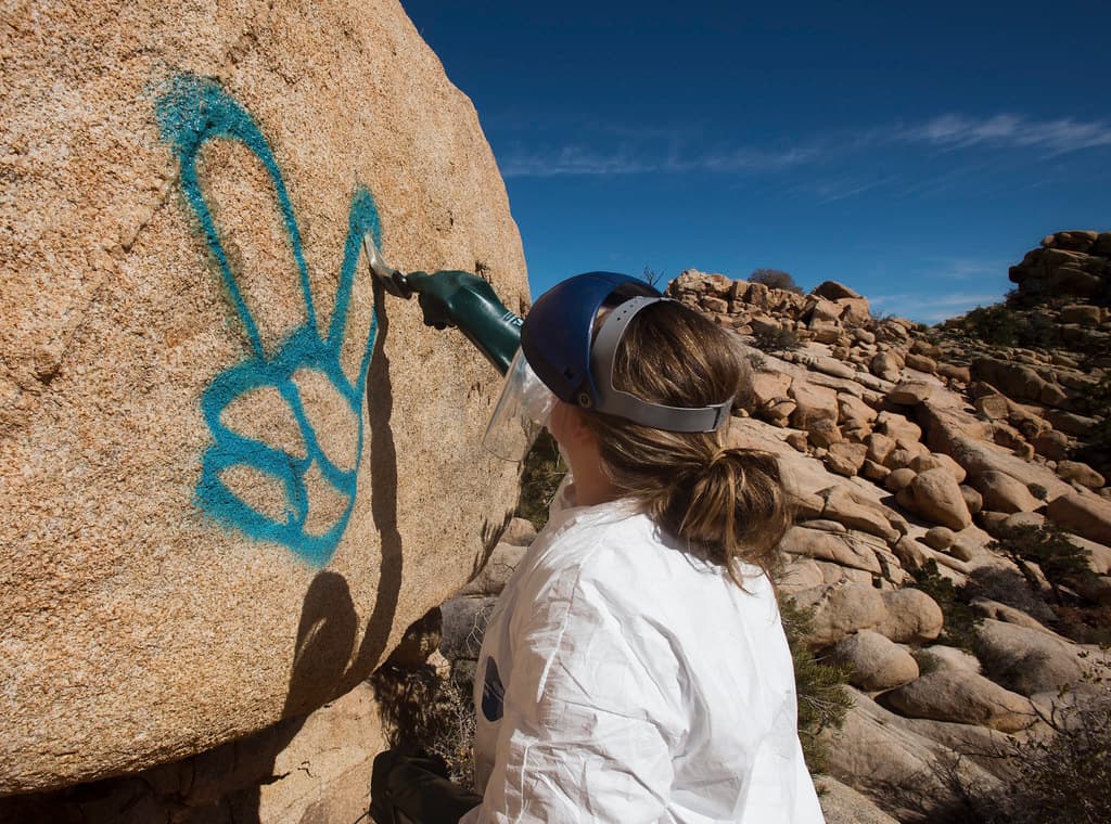 Applying Elephant Snot Graffiti Remover
