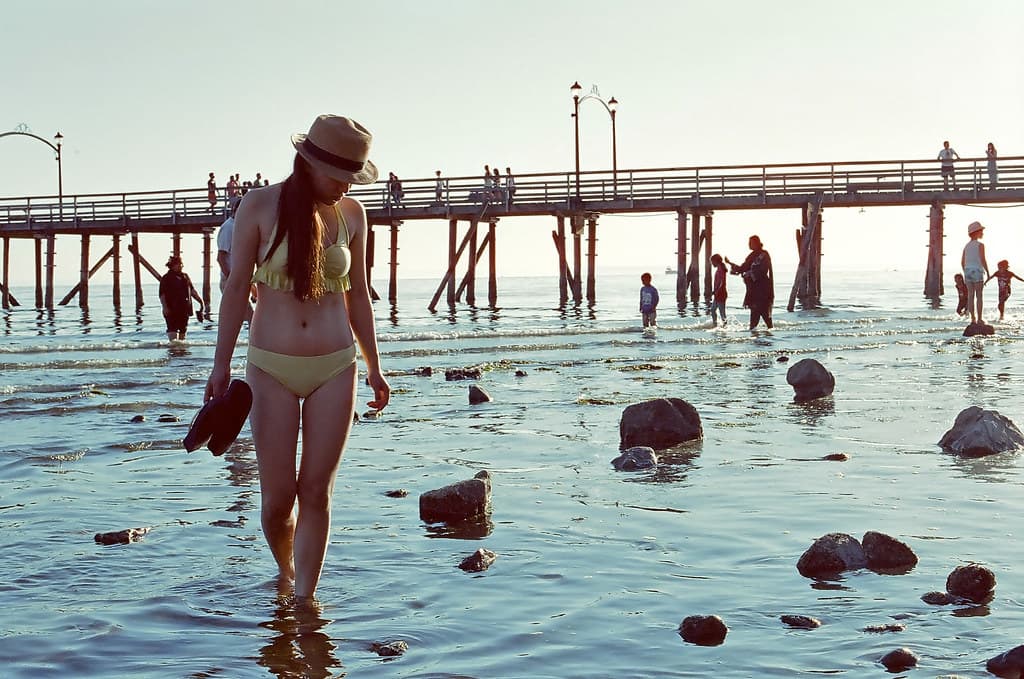 Walking Through Low Tide at the Beach