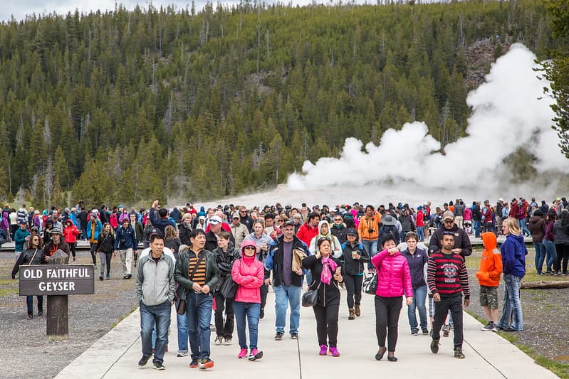 People leaving the Old Fatihful viewing area after an eruption.