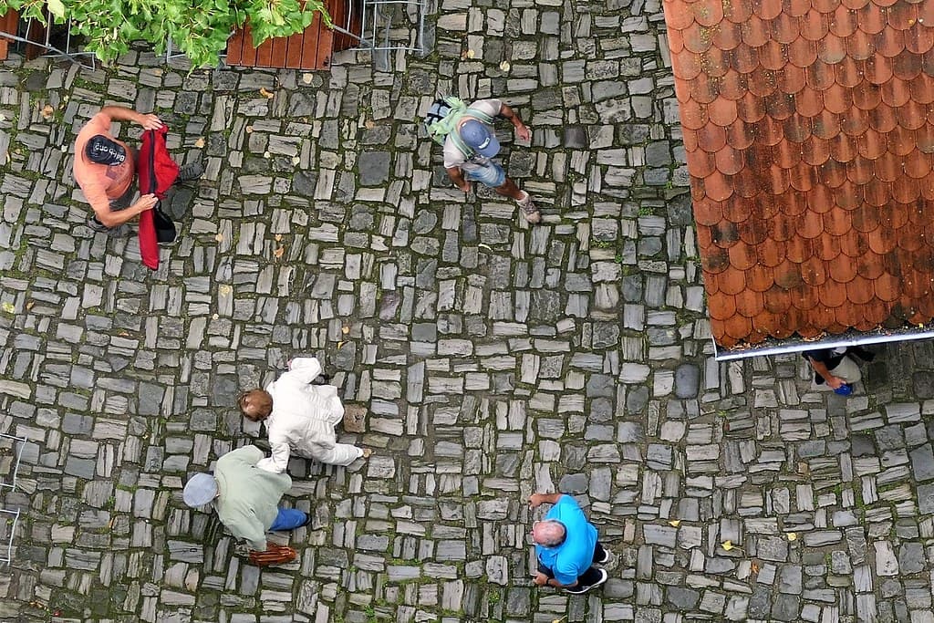 People in castle courtyard