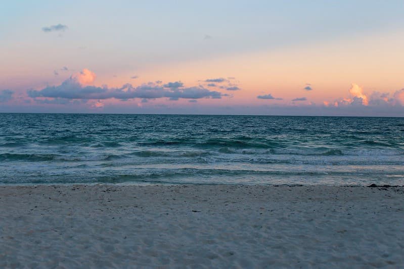 Ocean Waves on Beach at Sunset