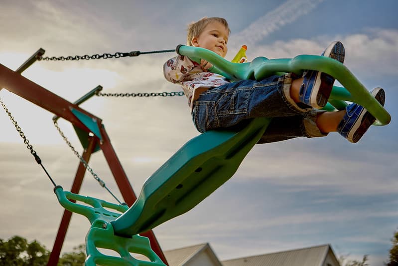 Child on Swing Set