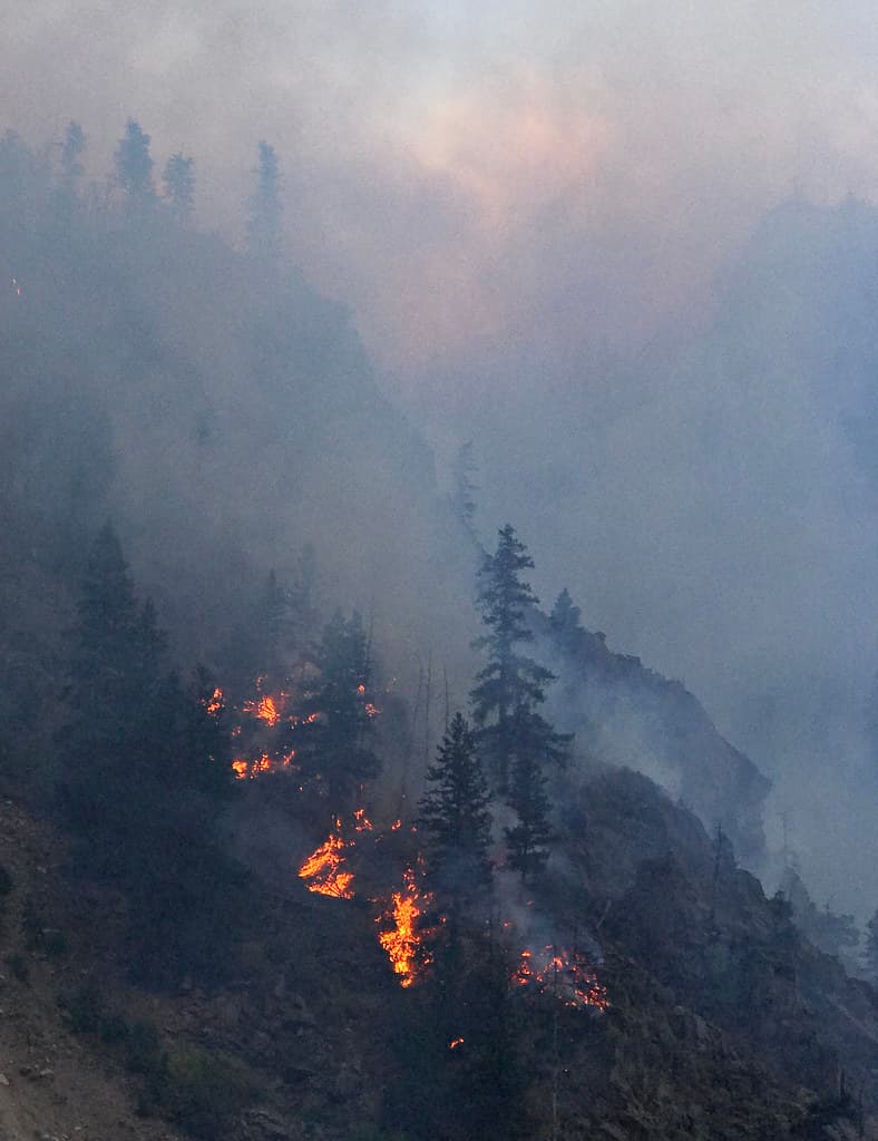 Fire backing down Glenwood Canyon