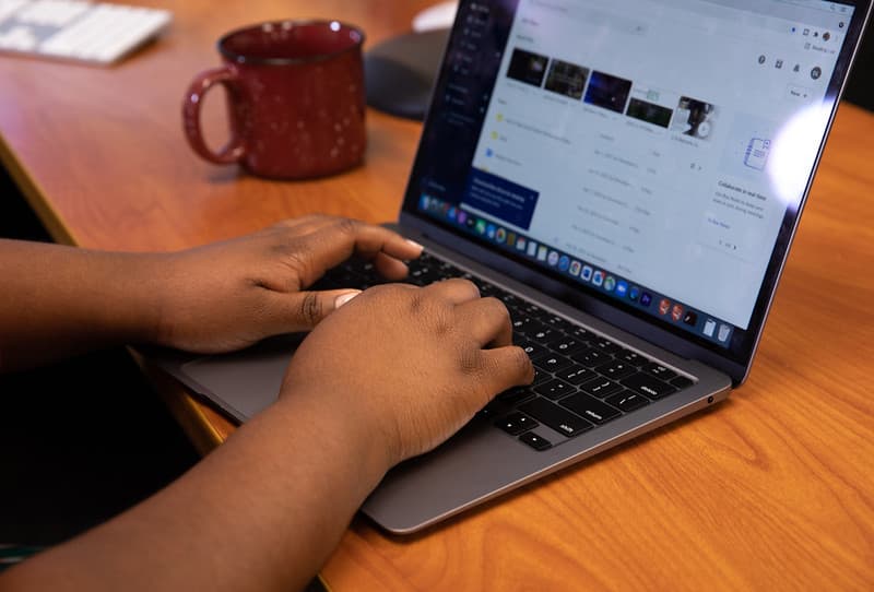 Typing On Laptop