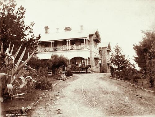 Warwick Hospital with buggy and three people, 1897