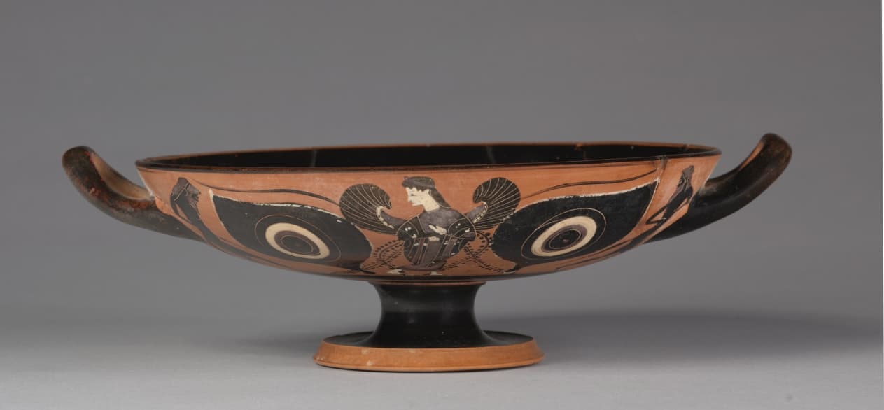 Black-Figure Eye Cup: Iris and Satyrs (A, B); Gorgoneion (I)